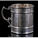 A silver Christening mug, dated Birmingham 1916, engraved, 6cm high, weight 51g.