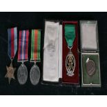 A WWII medal trio including the 1939-1945 Star Medal, War Medal and Defence Medal, together with a