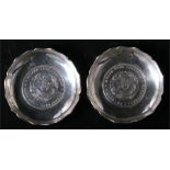 A pair of Chinese silver coin dishes, Kwang Tung Province, 7cm diameter, weight 88.5g.