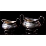 A matching silver sugar bowl and milk jug, Sheffield 1924, total weight 351g.