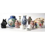 An early 19th century Chinese clobbered vase (a/f) a Beswick Scottie dog; a Poole Pottery biscuit