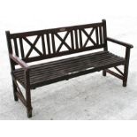 A garden bench, 152cms (60ins) wide.