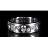 An 18ct white gold diamond ring set with seven various cut diamonds, approx 1ct.