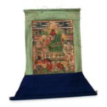 A Sino Tibetan thangka, with central Guandi figure and further deities, 24 by 31cms.