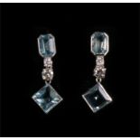 A pair of aquamarine and diamond drop earrings, set in white gold (tests as 18ct), each 2.5cms