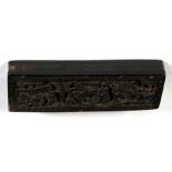A 19th century Chinese tortoiseshell travelling comb, carved to both side with figural scenes with