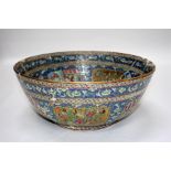 A 19th century famille rose bowl, decorated with figural panels and having a Persian gilt script