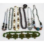 A group of Venetian glass necklaces, an Art Deco bakelite phenolic plastic necklace, and other
