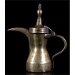 A Turkish / Islamic Dallah coffee pot with impressed mark to the body, 26cm (10.25ins) high.