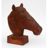 A cast iron model of a horse head, 44cm (17.25ins) high.