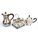 A silver teapot, Sheffield 1920 inscribed, a silver plated egg cup stand and a silver plated