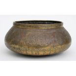 An Islamic brass Mamluk bowl, decorated with medallions and calligraphy, 24cm (9.5ins) diameter.