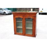 A Victorian mahogany two-door glazed bookcase top, 100cm (39.5ins) wide.