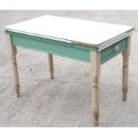 A painted pine kitchen table with single drawer, on turned legs, 113cm (44.5ins) wide.