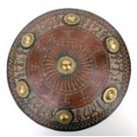 A copper & brass shield, possibly Turkish, 38cms diameter.