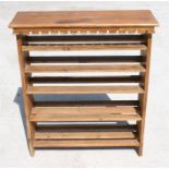 A stripped pine five-tier shoe rack, 79cm (31ins) wide.