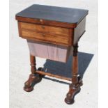 A Victorian figured rosewood sewing table, the fold-over top above two frieze drawers with silk well