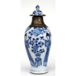 An 18th / 19th century blue & white vase and cover, Kangxi Artemisia leaf mark to base, with white