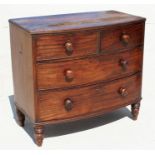 A Victorian figured mahogany bow fronted chest of two short and two long graduated drawers, standing