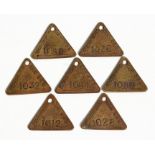 Seven mid 20th century Brodsworth Main NCB coal mine brass Lamp Checks or Tallies.