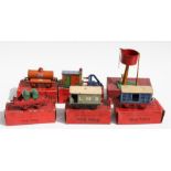 A large collection of Hornby 'O' gauge clockwork locomotives and accessories including a