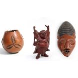 A African Zulu Gourd pot with wire work decoration, an African wall mask and a Chinese figure (3)