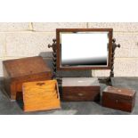 An Edwardian oak dressing table mirror on barley twist supports, an oak stationary box, an oak