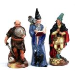 Three Royal Doulton figurines comprising 'The Wizard' HN2877; 'Friar Tuck' HN2143, and 'The Pied