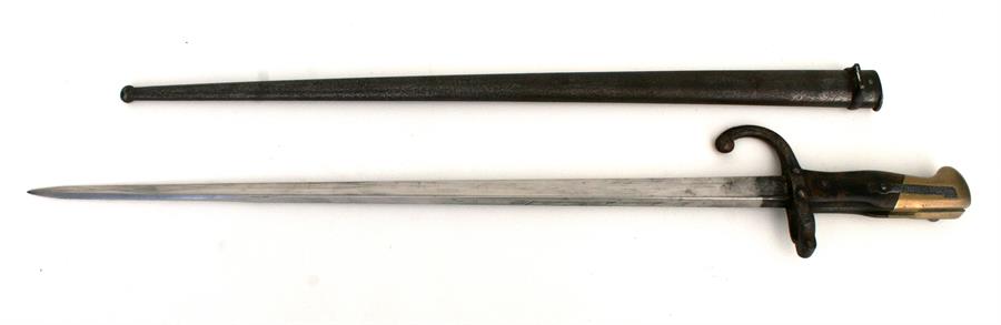 A late 19th century French model 1874 Gras bayonet in its steel scabbard. Made at the St Etienne