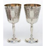 A pair of silver goblets, with engraved foliate scroll decoration, Birmingham 1970, 14cm (4.5ins)