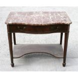 A 19th century figured mahogany serpentine fronted side table, the figured rouge marbled top above a