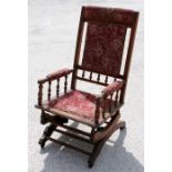 A late 19th century American walnut rocking chair.