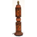An Indian painted table lamp, of octagonal form, decorated with figures, 59cms (23.25ins) high.