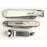 A silver multi tool pipe tamper, a silver cigar cutter, and a silver bladed fruit knife (3)