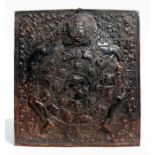 A Tibetan patinated copper repousse Mandela plaque, 27cms by 30cms (10.5ins by 12ins).