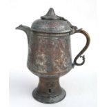 A Turkish tinned copper coffee pot engraved with foliate decoration, 29cm (11.5ins) high.