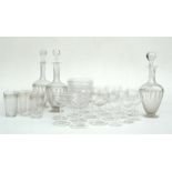 A quantity of Edwardian etched glass to include wine glasses, sherry glasses, decanters and finger