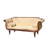 A William IV mahogany upholstered scroll-end sofa with ormolu mounts, on turned & reeded legs, 230cm