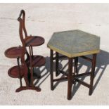 An Edwardian mahogany double folding cake stand, together with a hexagonal brass topped tiffin table