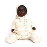 An Armand Marseilles black bisque porcelain jointed doll with brown sleeping eyes and open mouth,