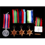 A WWII medal group comprising a 1934-45 Star and War medal, Atlantic Star medal and Pacific Star