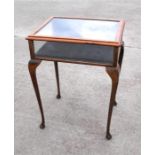 A pine and beech glazed vitrine or display cabinet, standing on slender cabriole legs, 59cm (