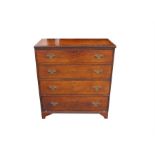 An early 19th century mahogany chest, the crossbanded top above four long graduated drawers,