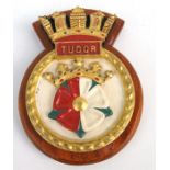 A hand painted Military aluminium Royal Navy Ships Crest of the WWII submarine HMS Tudor, 16 by 13cm