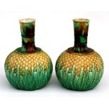 A pair of 19th century majolica pineapple vases, 21cms (8.25ins) high. Condition Report Crazing to