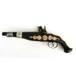 A decorative flintlock pistol with bone inlay 37cm (14.25ins) long.