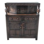 A carved oak buffet or sideboard, 110cm (43.5ins) wide.