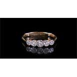 An 18ct gold five stone diamond ring.