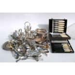 A Victorian silver-plated egg cup stand, two silver-plated wine coasters, cased and uncased