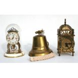 A Smiths eight-day brass mantel clock; an Anniversary clock and a modern brass ships bell (3).